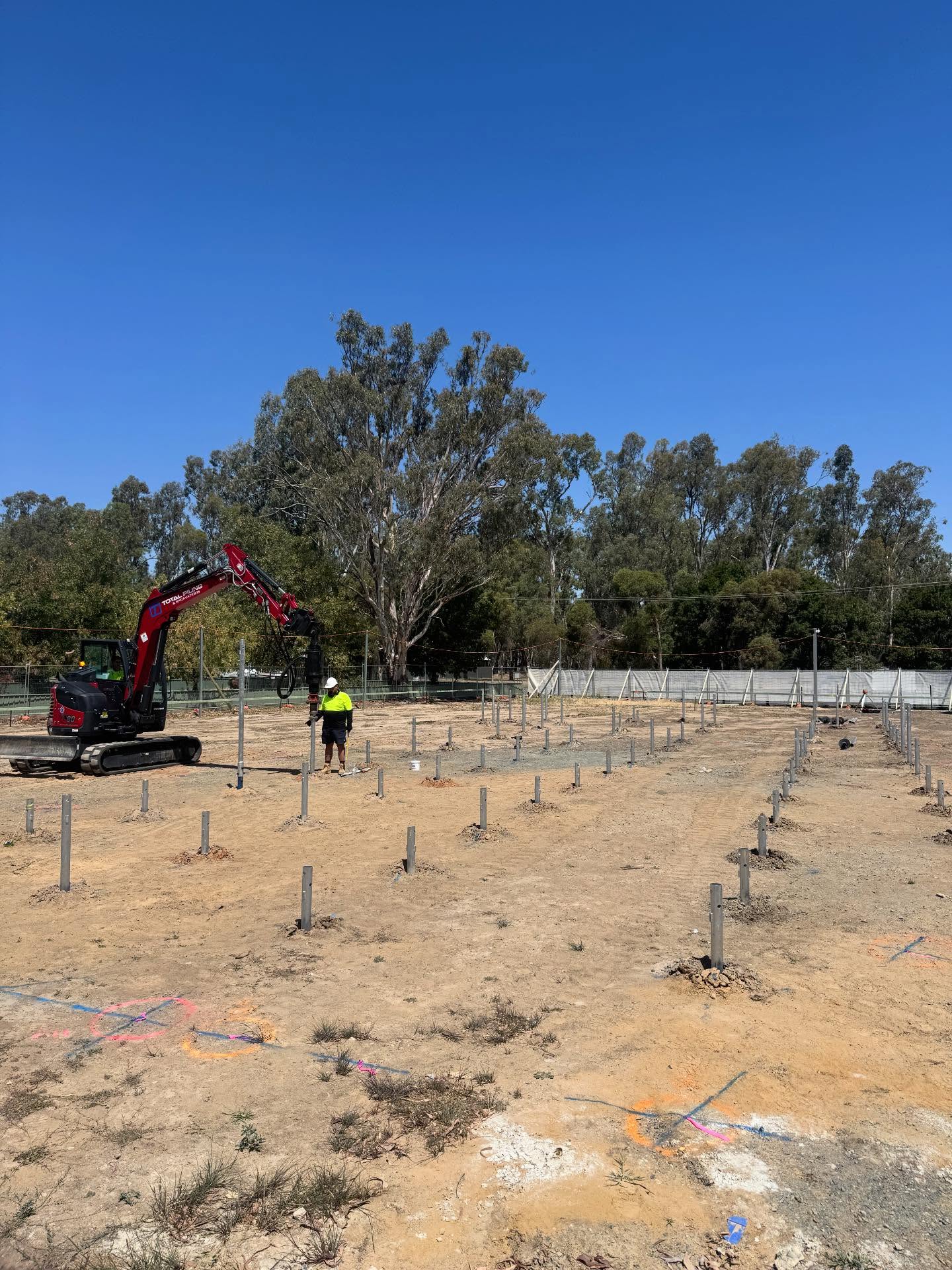Stack of Australian-made screw piles ready for distribution from Total Piling & Excavations