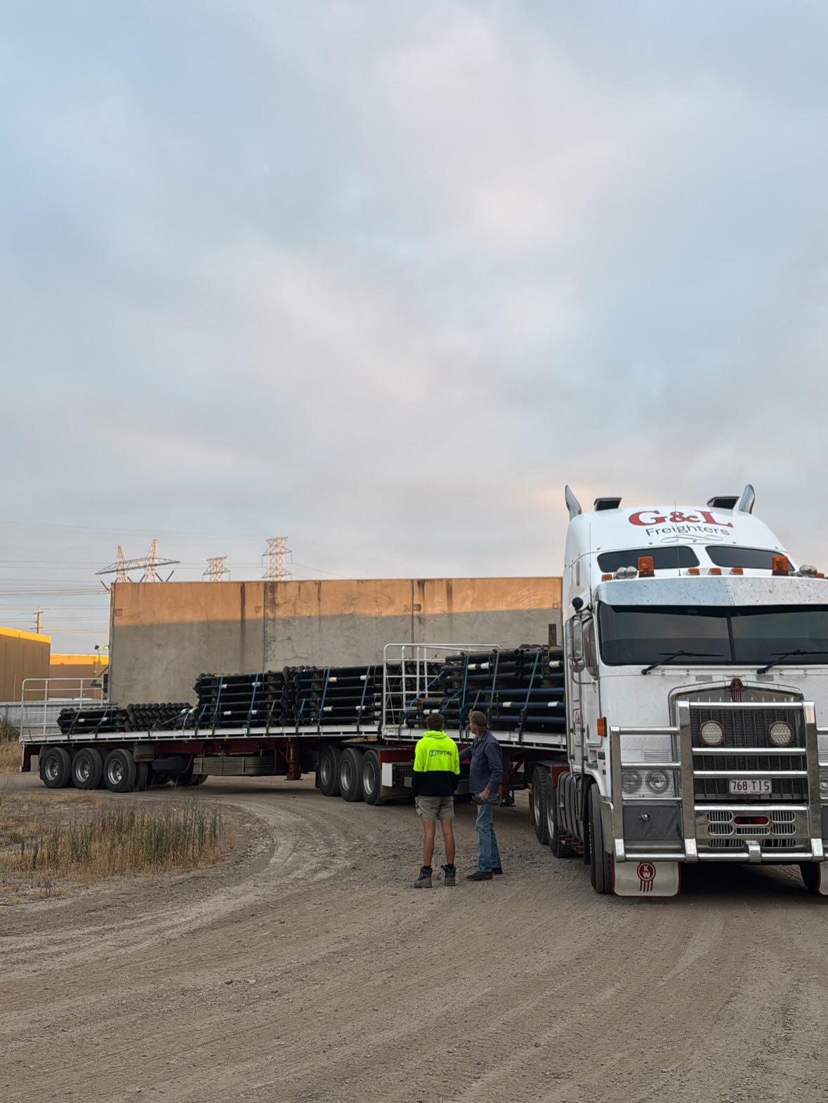 Truck loaded with palletised Australian-made screw piles for distribution